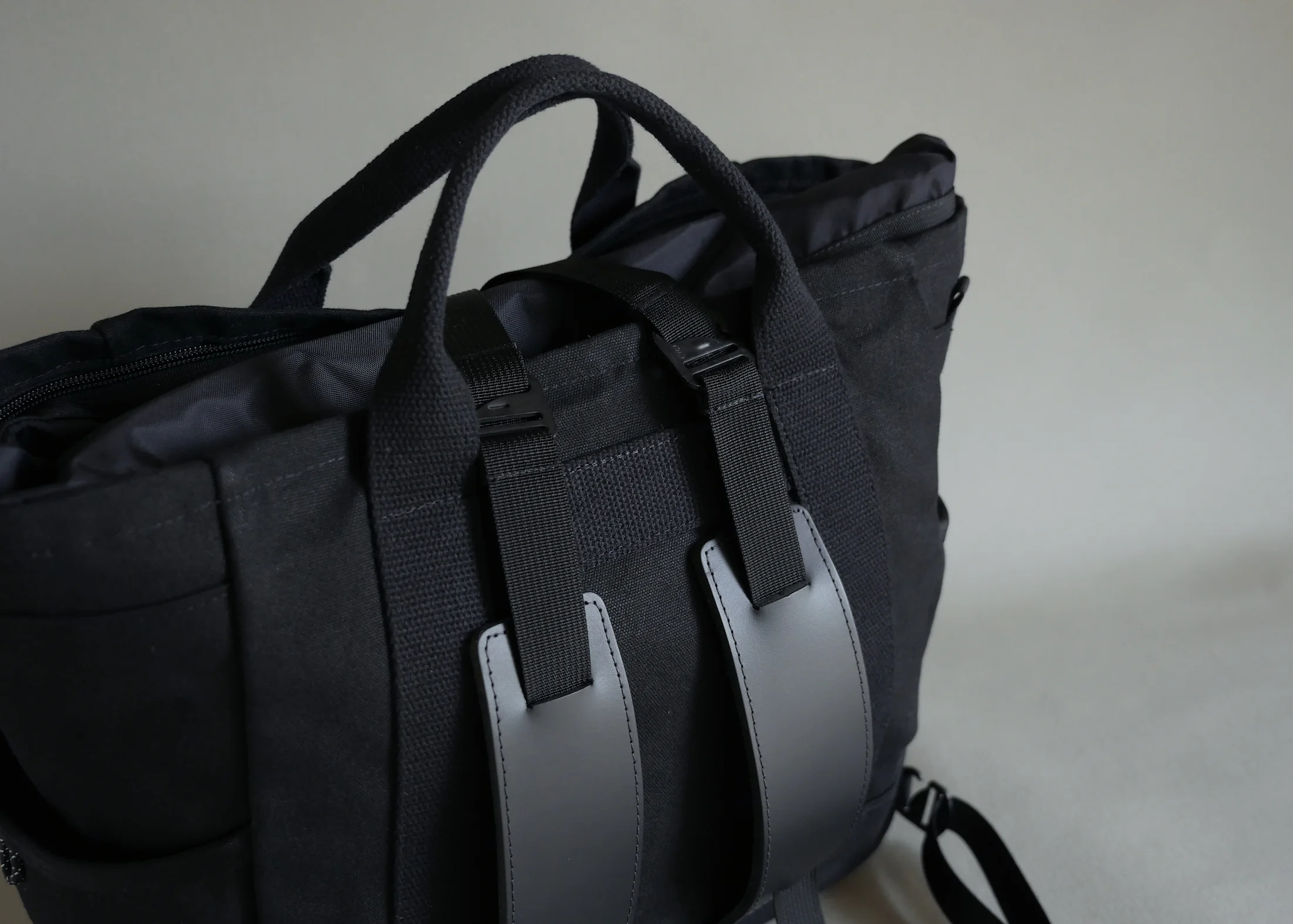 The strap pads are cut, glued and sewn individually out of high-grade strap leather and backed with garment-grade pebble leather.