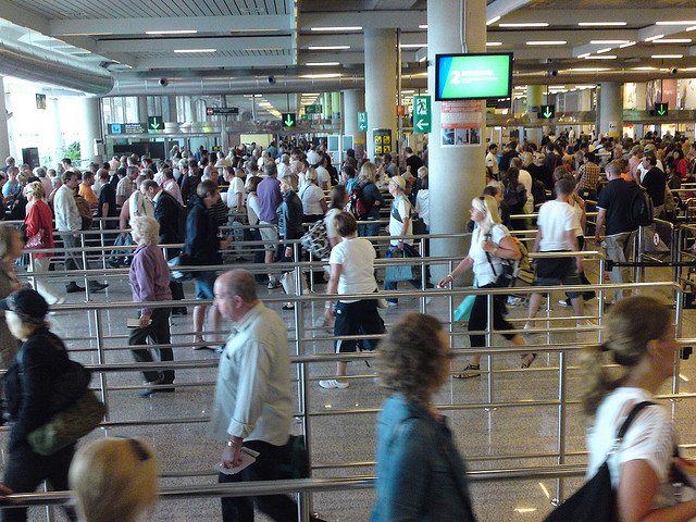 Here's what happens as a result of security theater at the Orlando airport:
You wait in line at least twenty minutes
There's a scrum of pushing and shoving
The staff are unhappy and not afraid to share it
An unreasonable workload leads to fatigue and errors
People miss their flights
Here's what doesn't happen:
Security is not increased
Peace of mind is not enhanced
In other words, we're paying a significant tax (time and money) and getting nothing in return. In fact, we get worse than nothing. We could call it an anxiety program, instead of a tax. (After all, when you pay a luxury tax, you get some hard-won luxury as part of the deal).
The reason the TSA keeps changing the rules is not because the rules work, but because changing the rules creates more anxiety (for bad guys, they say, but for us too).
via sethgodin.typepad.com
Another great example of a horrible customer experience. Government is big and powerful. With all its might it imposes a set of regulations onto businesses to (try to) achieve a desired goal.
Three results of the current system:
Unhappy employees : All the KPI's put in place are based on operational efficiency and effectiveness, the soft aspect of customer service and a personal connection with the customer/traveler is ignored. Staff is used as a cog in a system created to "guarantee" safety. By removing all possibility to express their own personality, ideas, and direction to the company they become disengages and unmotivated.
Unhappy customers: First travelers stand in line to check in. They have had bad experiences in the past so at this point they have booked a ticket with an airline which they know make their trip as easy as possible, including in the check out line. Then they arrive at security. The line is long, half the people are impatiently waiting as they are about to miss their flight. The traveler goes through the extended process of taking of half their clothes and taking out their laptop from the bag etc. etc. They hear a bark that states: "remove your belt sir" and that is the only interaction with the TSA agent...if you're lucky.
Unhappy government: Is there an increase in security? Is it worth the number of unhappy people?
Airports are unwilling to change because of their monopoly. Especially in cities with one major airport, airlines and travelers have no choice but to use that single one. In environments with multiple larger airports you often see a bigger effort to differentiate through a better customer experience.
What customer want is positive emotional cues, trust, and control . This can be done through proper communication, physical points of orientation, and much more. For a scattering of ideas check out the links below:
Jamin - Service Design Applied to Airport Security .
Engine Service Design - Case study for Terminal T5.
Innotour - Service Design in Copenhagen Airport.
Is your business imposed with regulations that make it difficult to create a great customer experience?