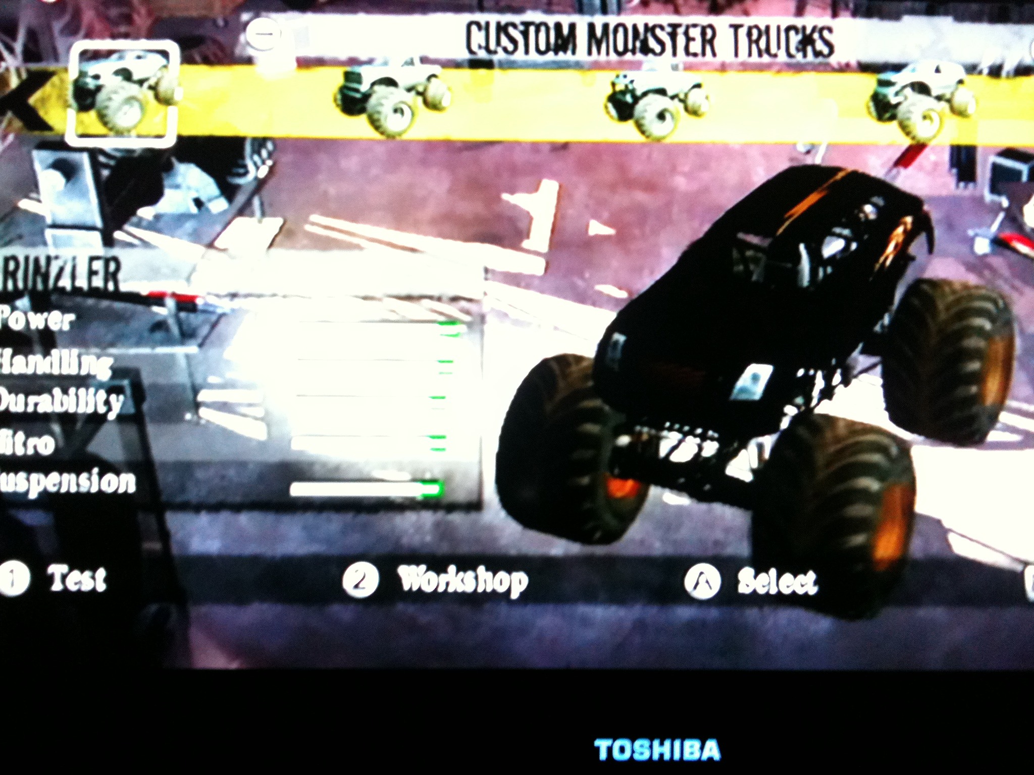 The boy customized some Monster Jam trucks: Rinzler, Tron, and C.L.U.