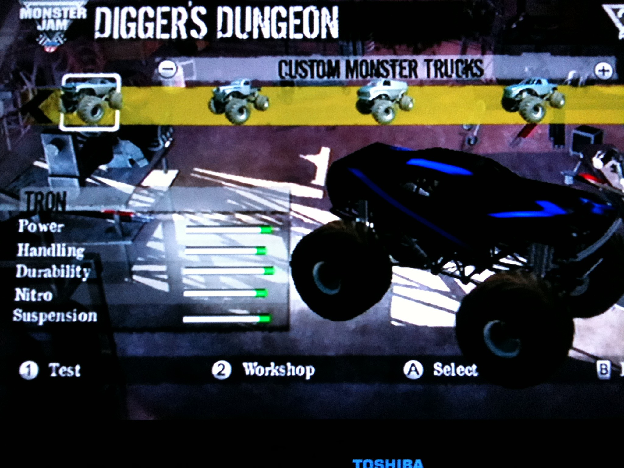The boy customized some Monster Jam trucks: Rinzler, Tron, and C.L.U.