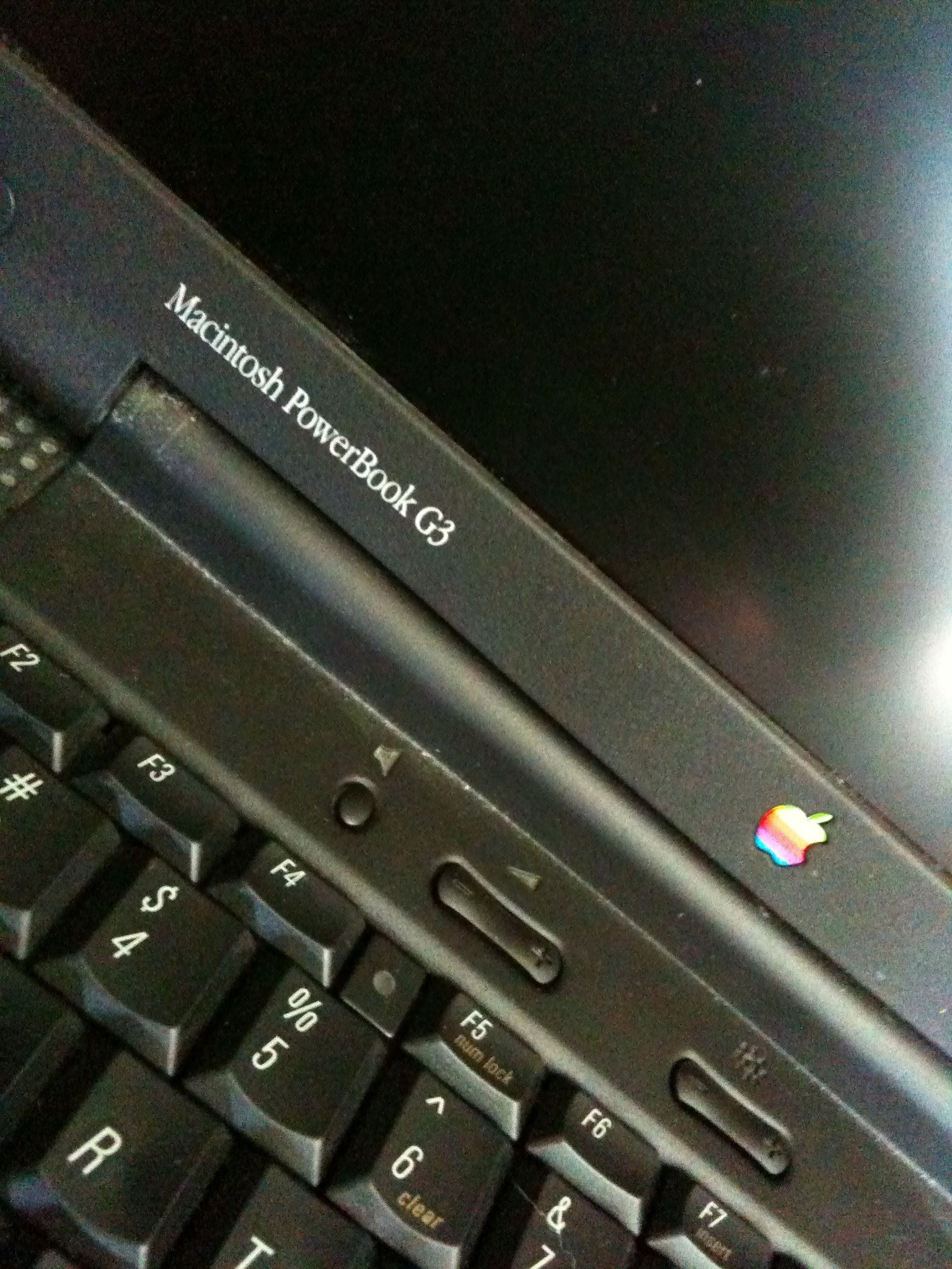 Wiping out an old school PowerBook to give to charity. 