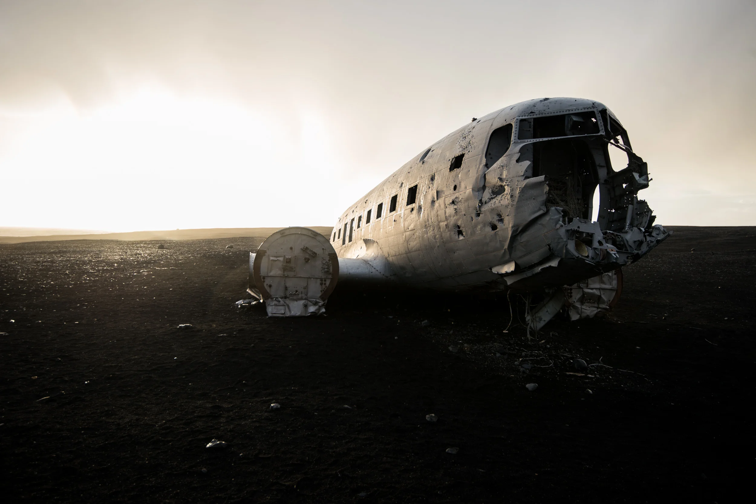 This US Navy plane that crashed in 1973, with no casualties, in the middle of miles and miles of black sand beach, is downright one of the most surreal places I've ever been