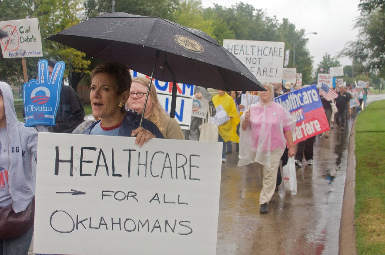 OKLAHOMA CITY, OK - SEPT. 13, 2009: Protesters march to the Oklahoma capitol building to demonstrate their support for President Obama's health care plan on September 13, 2009 in Oklahoma City, OK.