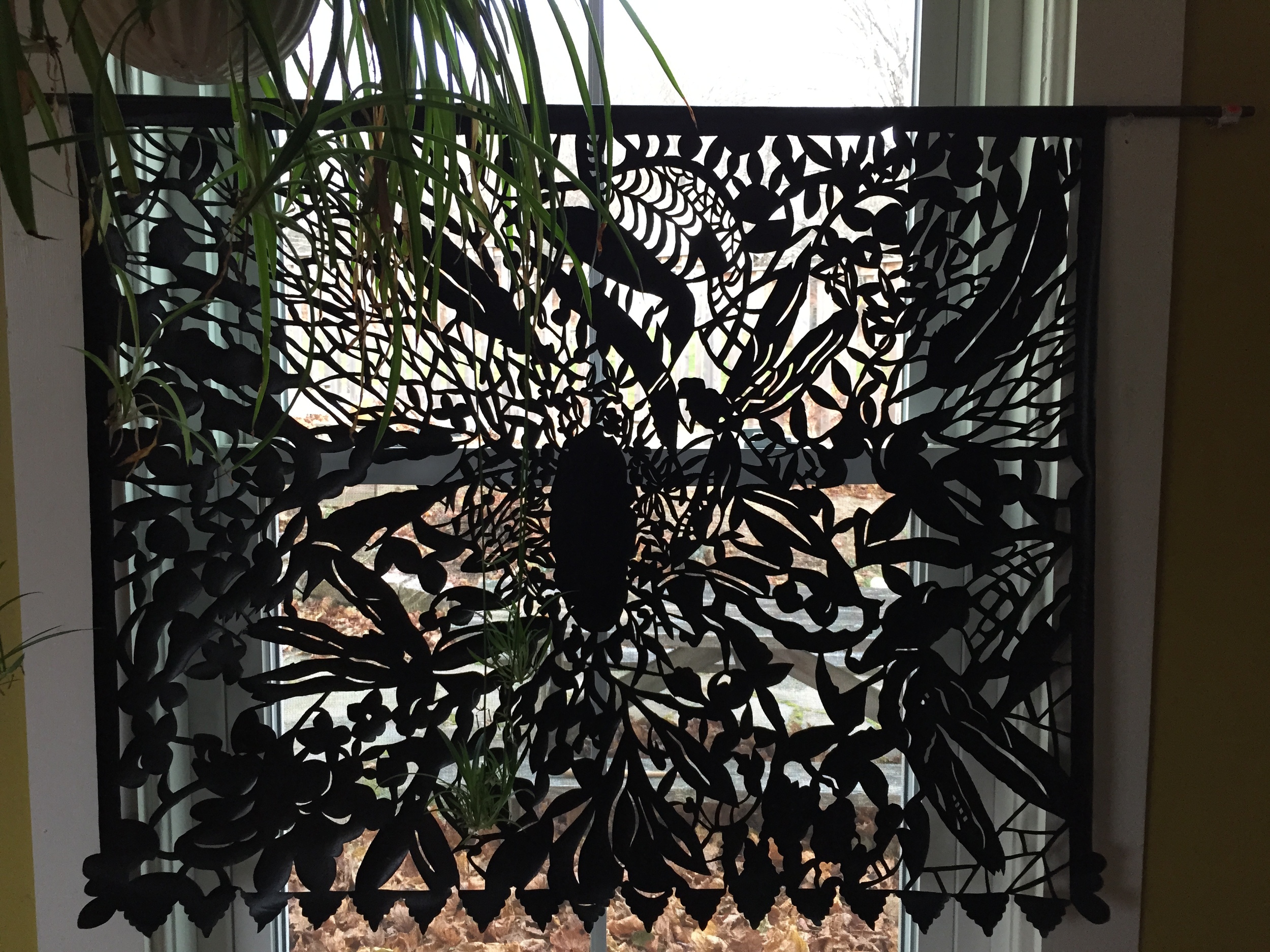 This is hanging in my kitchen window cut muslin and ink 2014