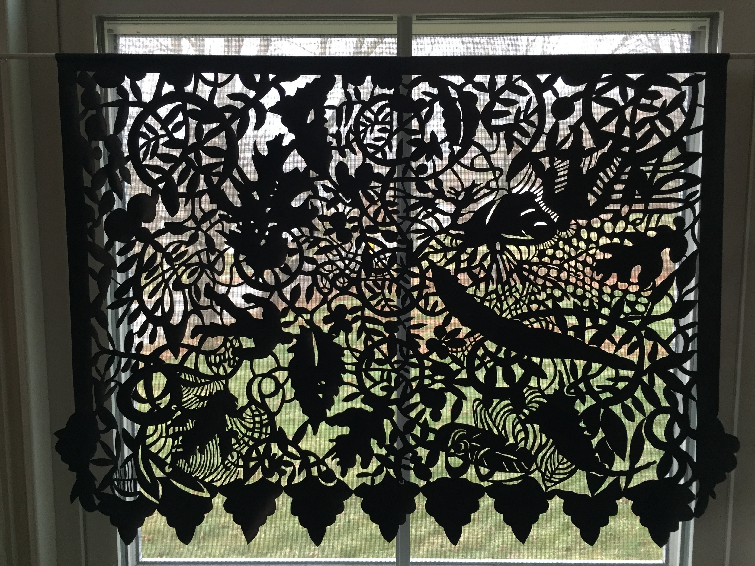   This is hanging in my dining room&nbsp;window   cut muslin and ink  2014 