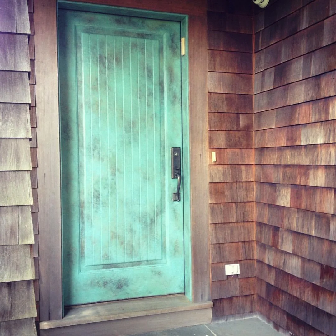 Faux verdigris door