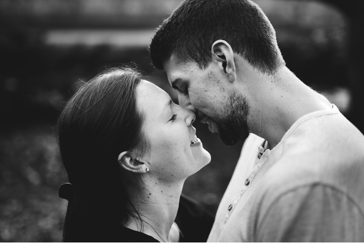 Candid black and white engaged couple in New York City.