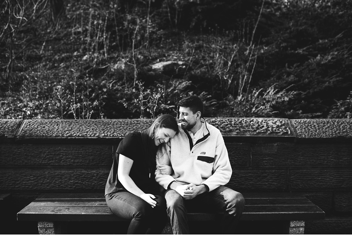 Happy engaged couple on 5th Ave in New York City.