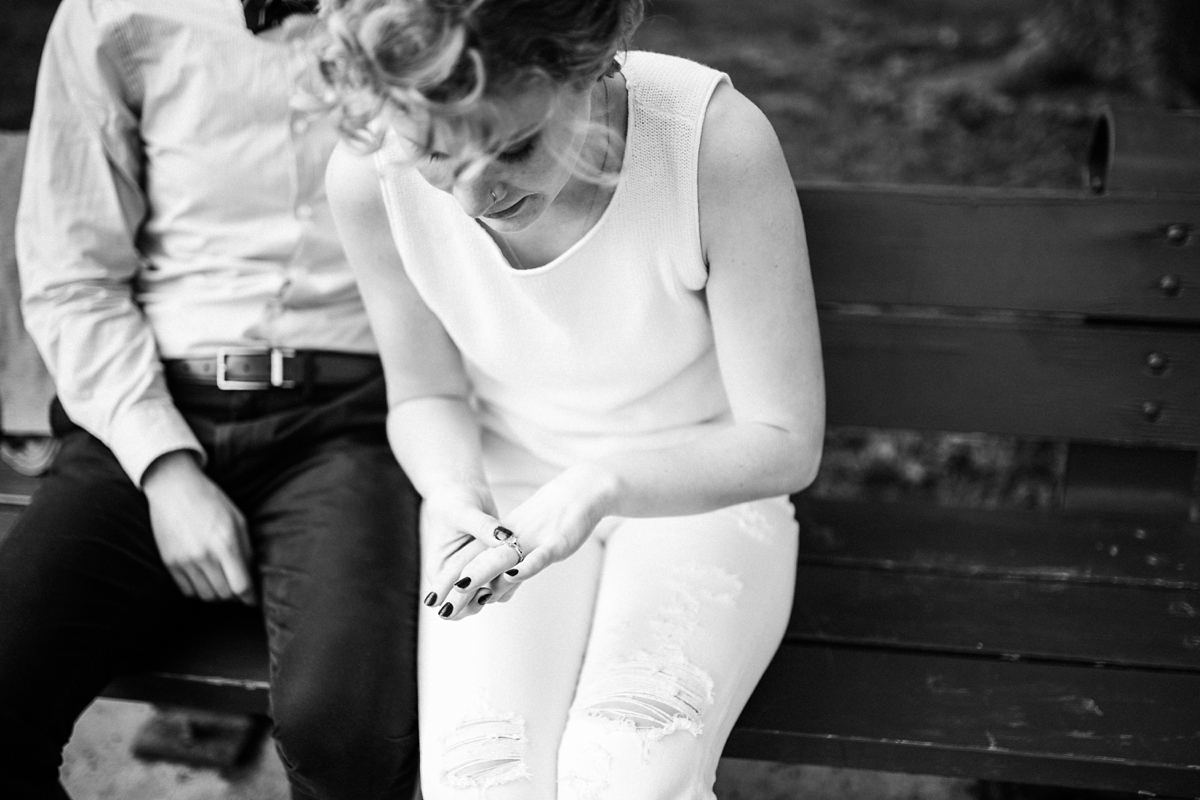 woman admiring engagement ring in Boston MA