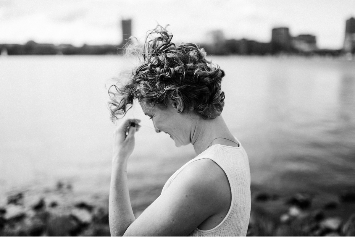 portrait of woman near river in Boston