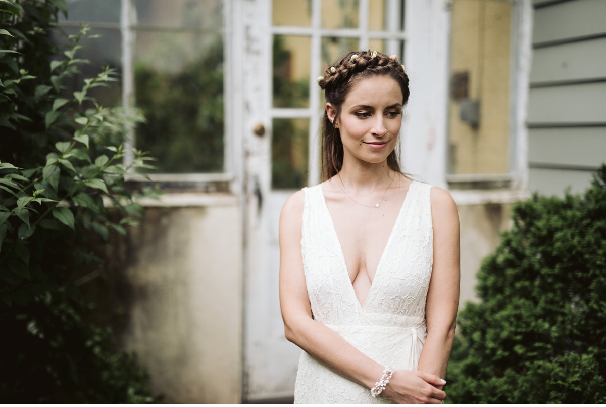 Bridal portrait near glass greenhouse Willowwood Arboretum