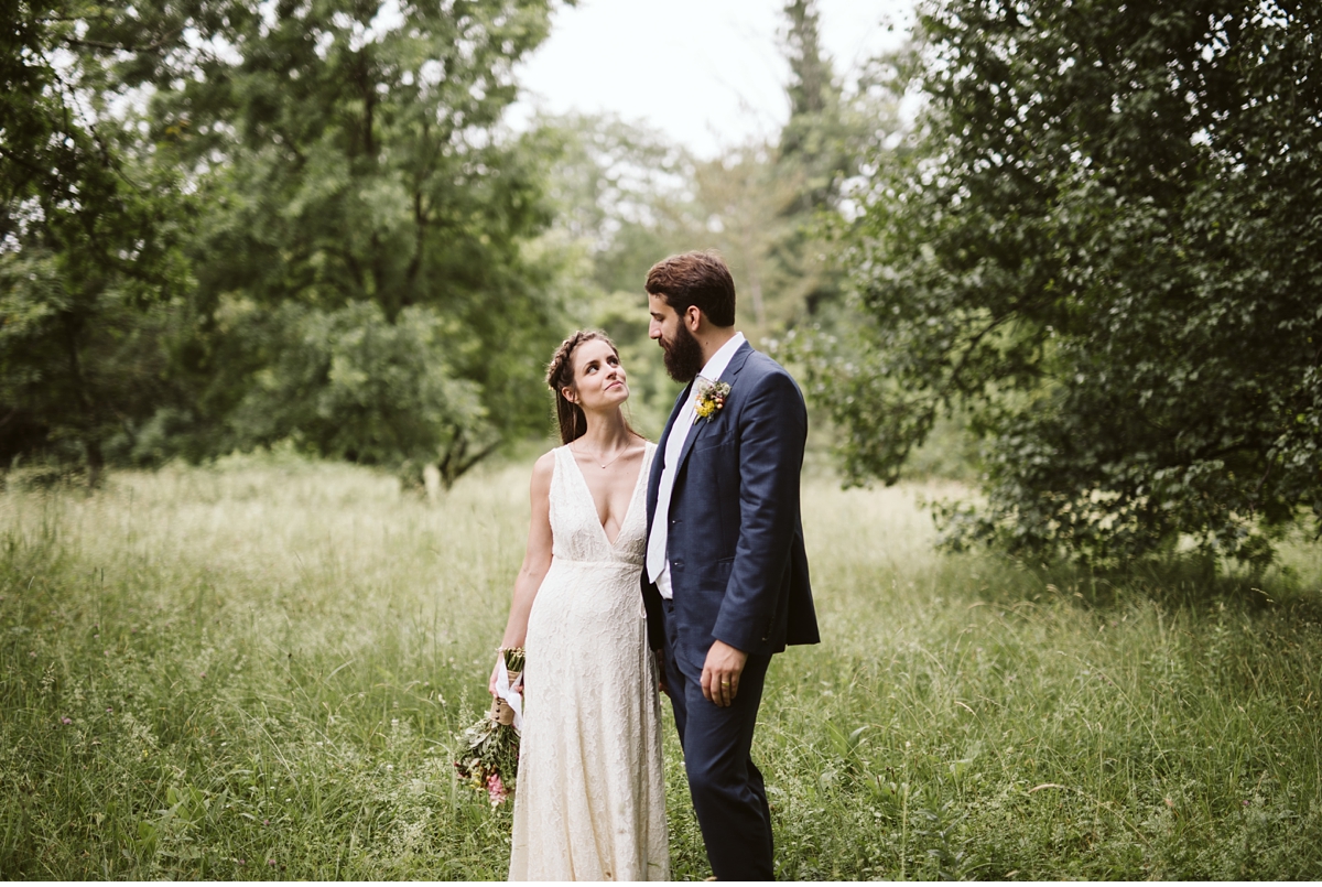 Quiet moment between bride and groom in wooded glen, Willowwood Arboretum