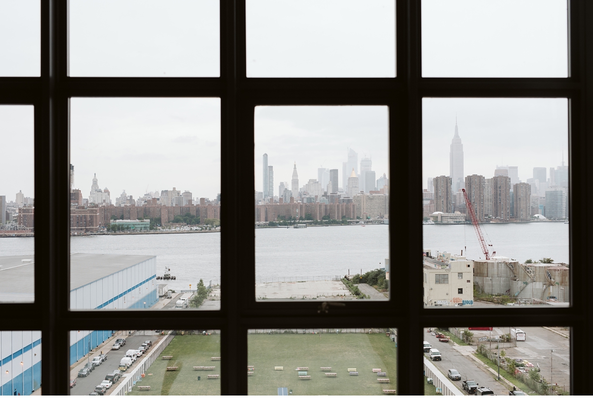 Manhattan skyline from hotel room at Wythe Hotel in Brooklyn
