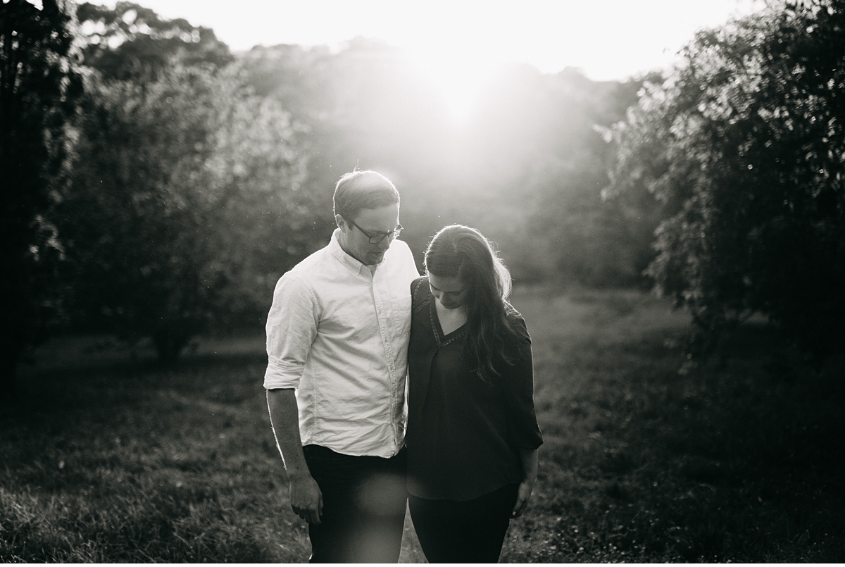 couple sharing a quiet moment on a hilltop at the Arnold Arboretum