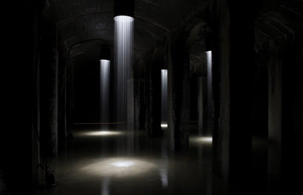"33 years since the cisterns were drained, the water is returned to the 4,320-square-foot water reservoir deep below Søndermarken. As visitors will be surrounded by water, both in the form of a large water surface covering the floor and 28 columns of shining falling water. Via walkways you move into an unknown darkness. The water mirror, reflects and is co-creator of both the visual and the musical part of the project, created by composer Martin Hall." From the installation website.