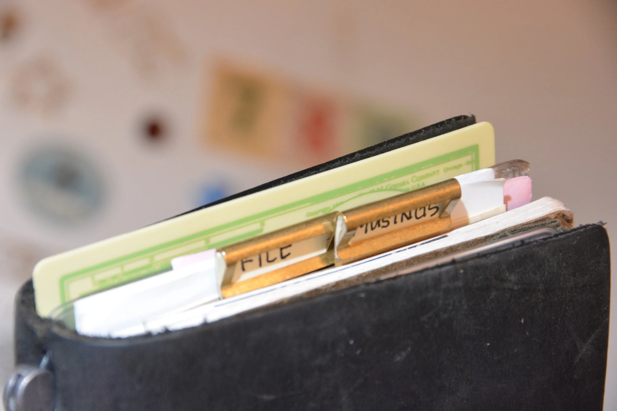 My notebook doesn't have much in it. I don't like clutter, so I would probably have no problem quickly turning to my notes nor my folder, but I love the index tabs made of warm brass. I find them aesthetically pleasing and would use all six, if I could find a practical reason to do so. 
