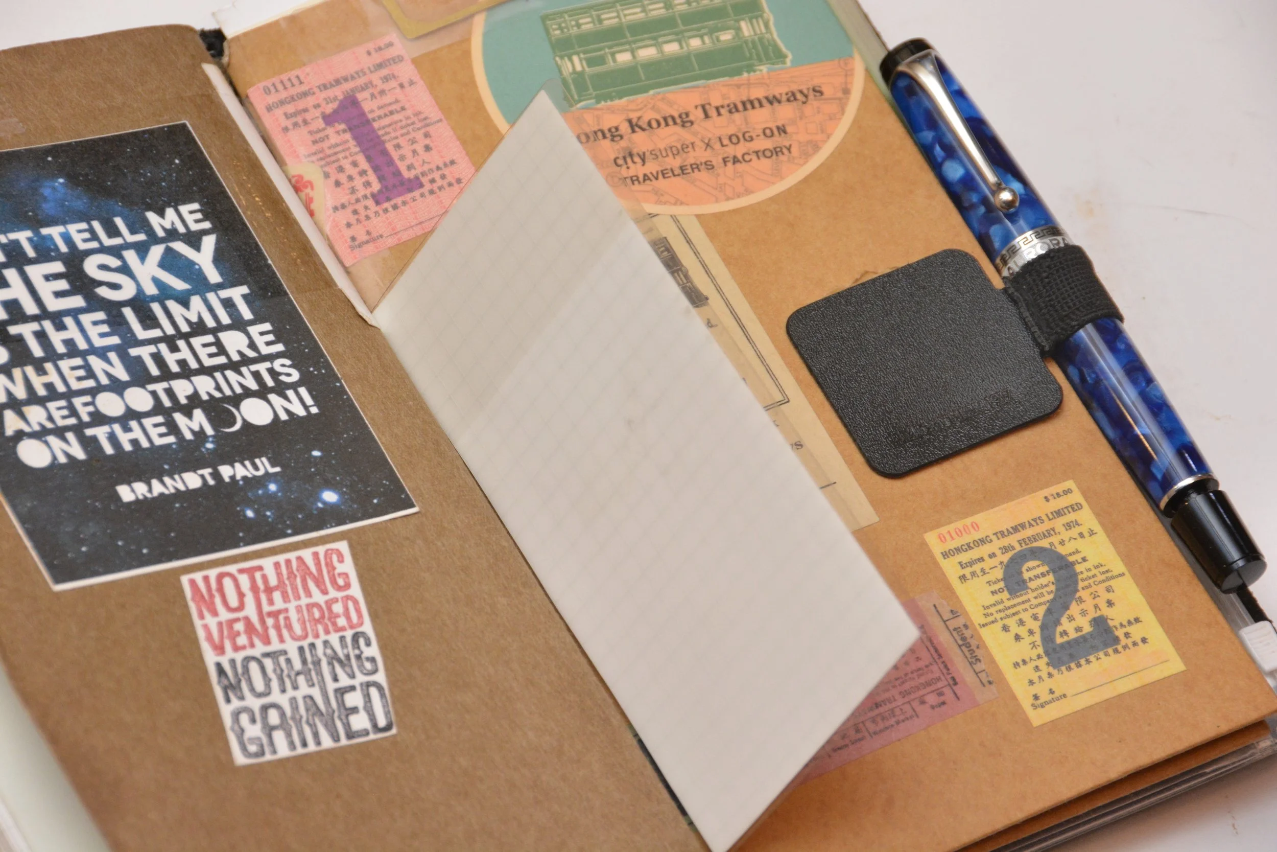 Transluscent sticky notes by Stalogy are favorites of mine. I write "lessons" on them and overlay my personal writing with them. It's conceptually meaningful to me and very much a part of my process. My new blue Aurora Optima fountain pen is now the only pen I carry. I have gone from have two pen loops to one and I use this pen constantly. It makes my heart sing. The pen loop is from Leuchtturm1917. 