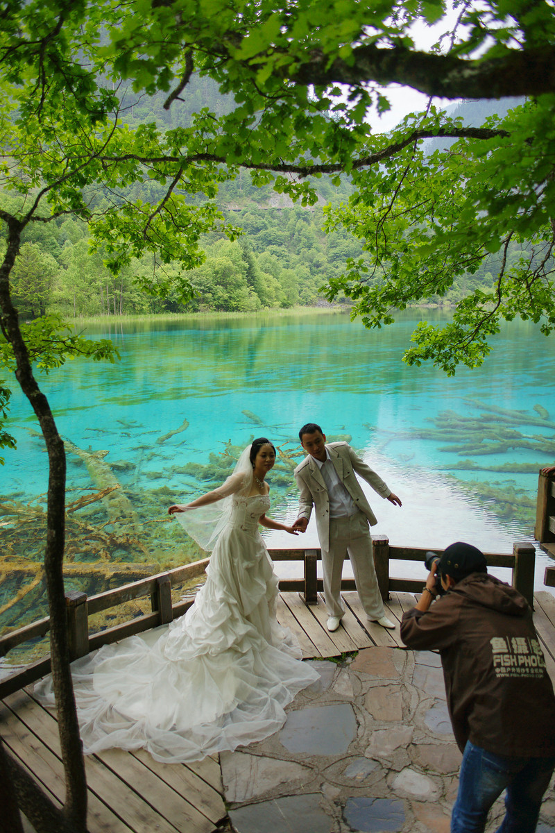 A couple have their wedding photos taken (Jiuzhaigou National Park, China)