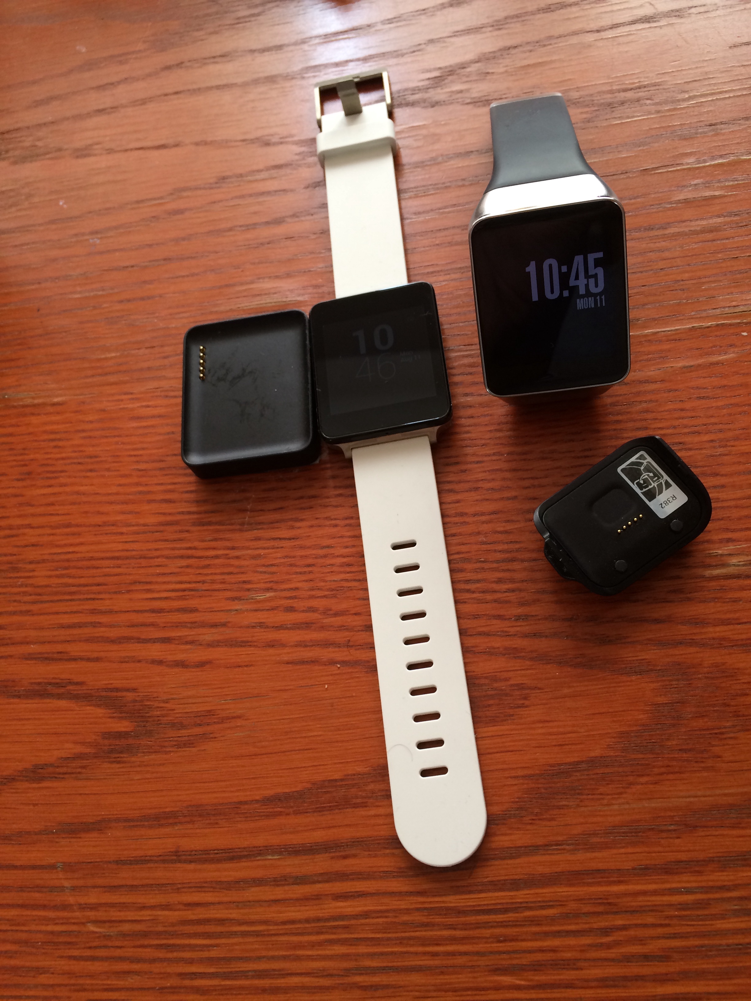 The attachment for each watch, which are needed in order to charge them. 