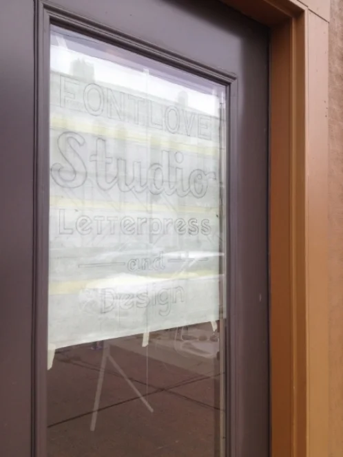 Taping the pattern to the door