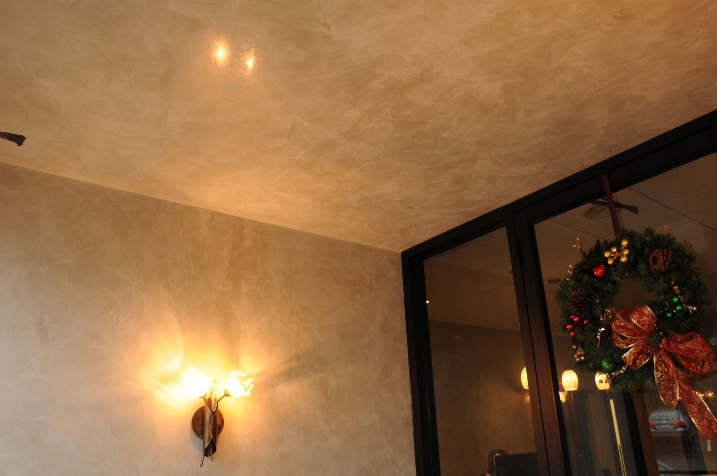 Venetian Plaster on walls and ceiling in foyer entrance.