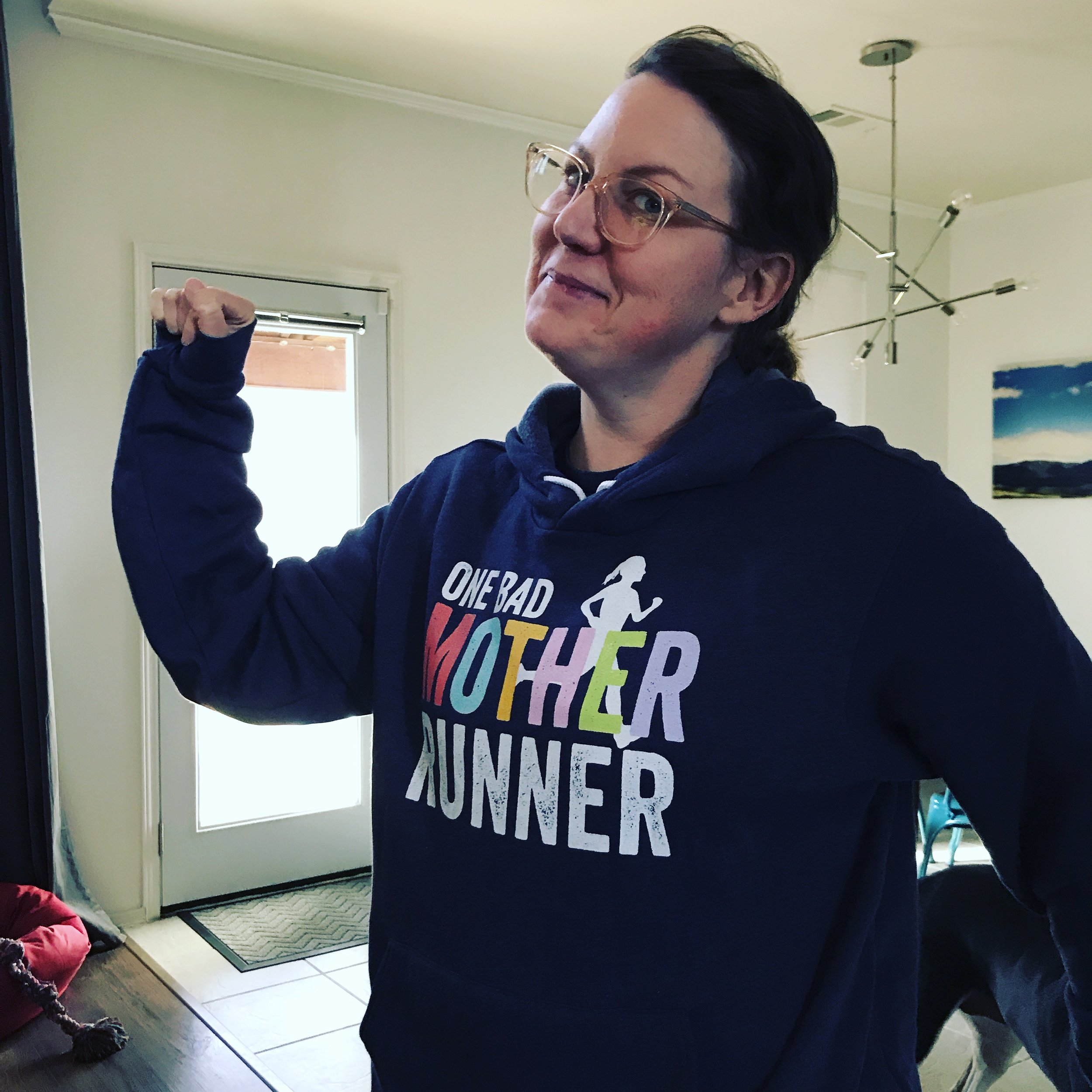 Kristi posing in her new design.