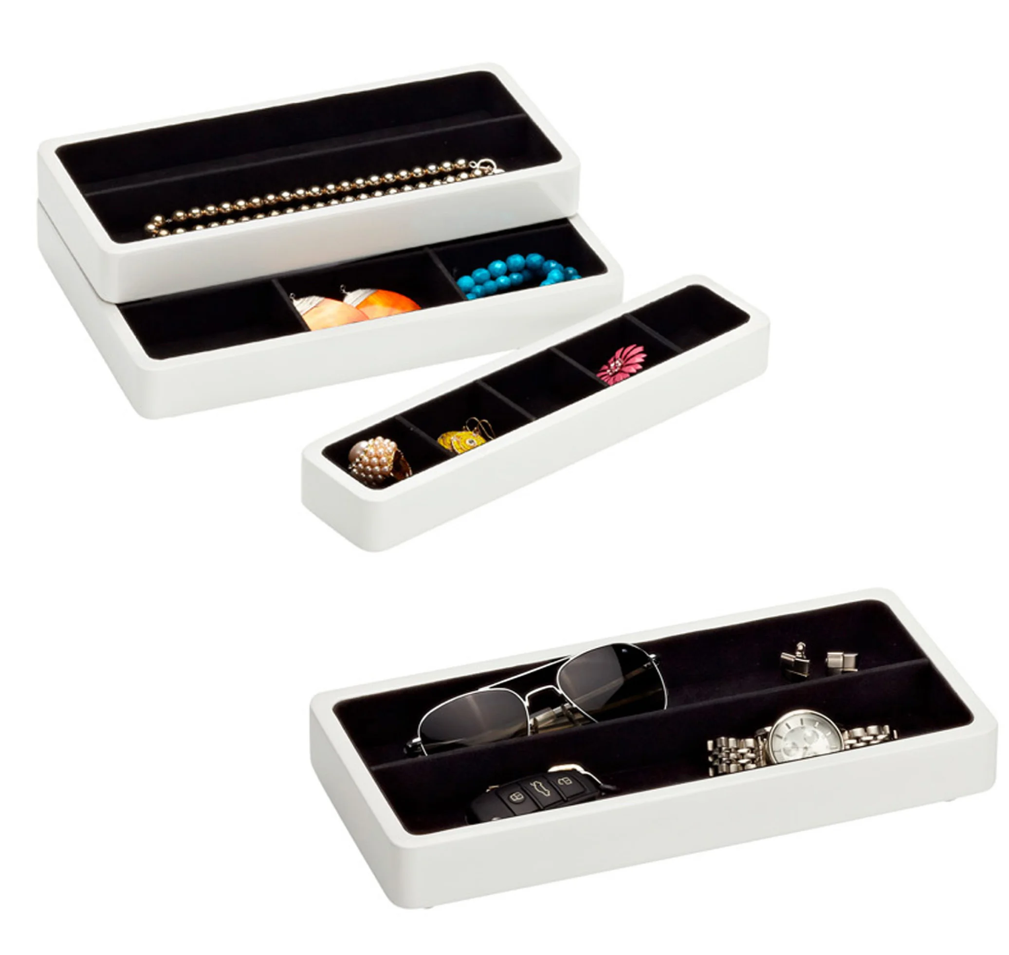 Simple modular jewelry trays stack on top of one another to take up a minimal amount of space on a tabletop while still providing a multitude of storage options for the user. Currently in production for The Container Store. (Image credit: The Container Store) 