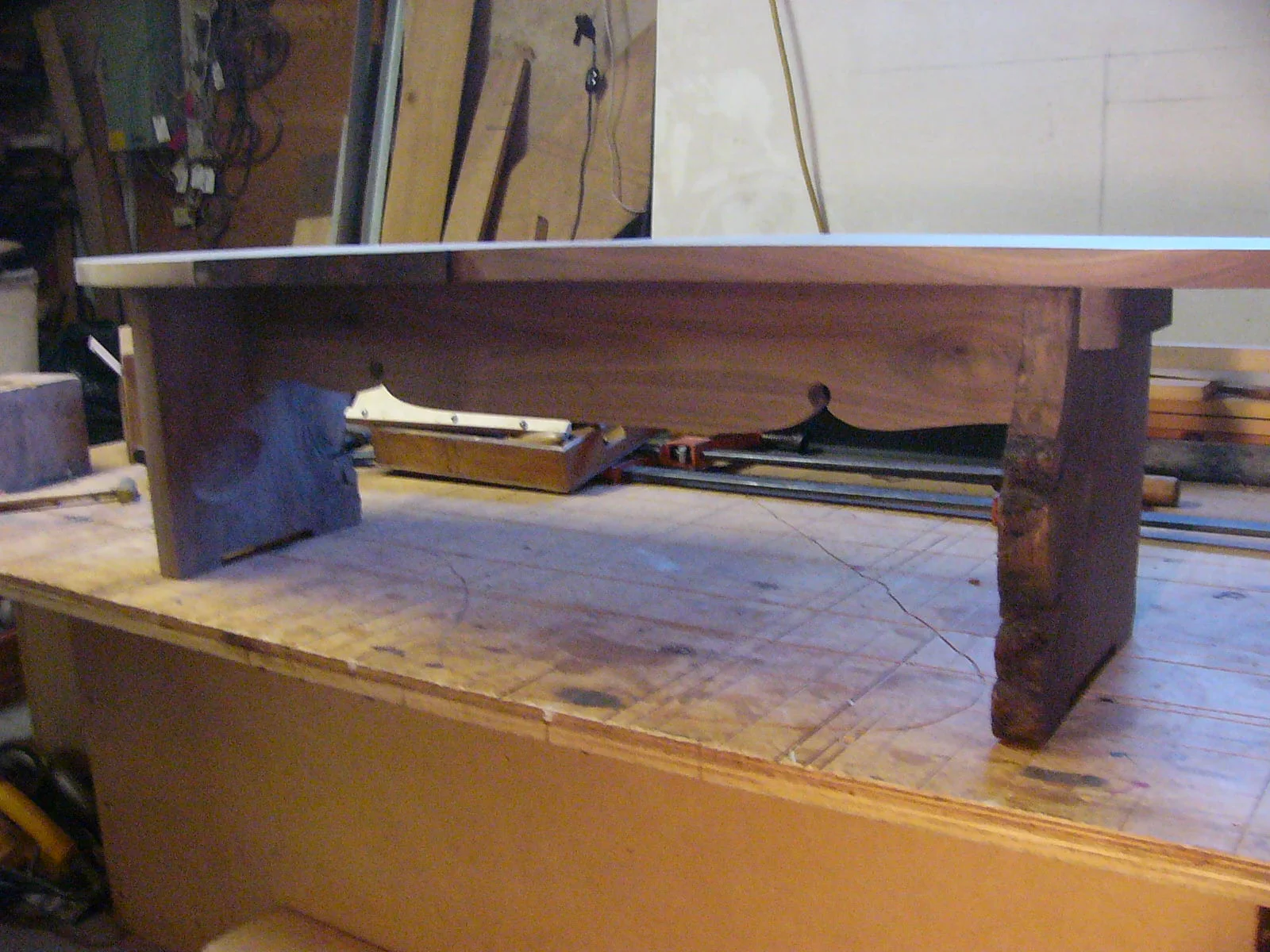 Coffee table, live edge and carved leg structure