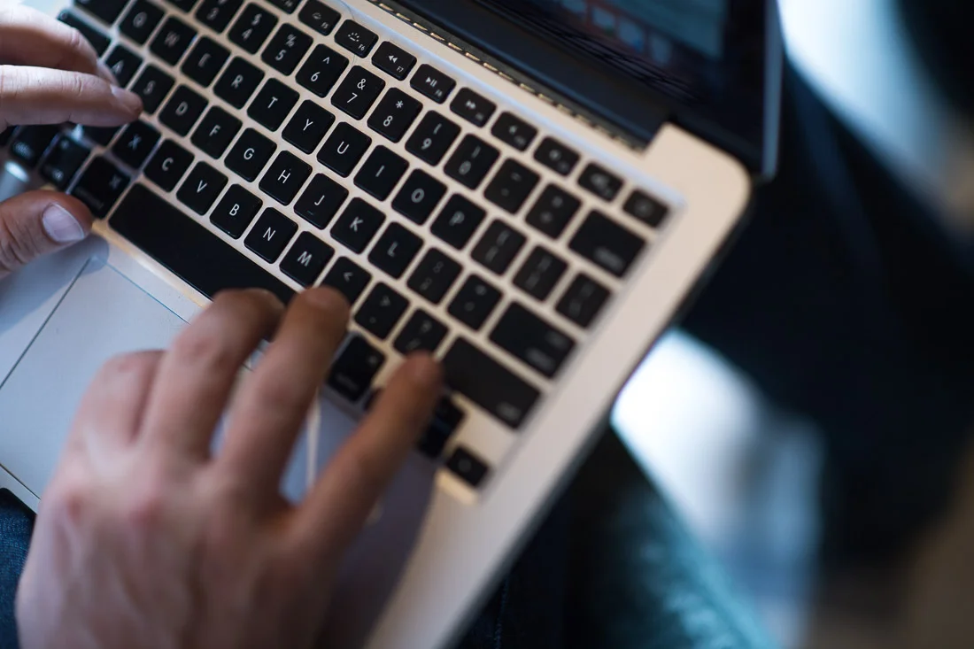 NYC Branded Lifestyle Portrait John Andrews closeup fingers typing on computer