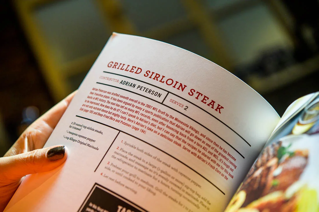 Branded Lifestyle Portrait chef author Daina Falk closeup recipe in her book