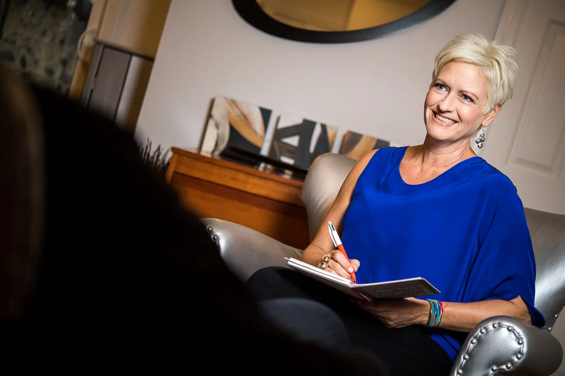 NYC Branded Lifestyle Portrait Speaker Coach Carolyn Herfurth consulting with client