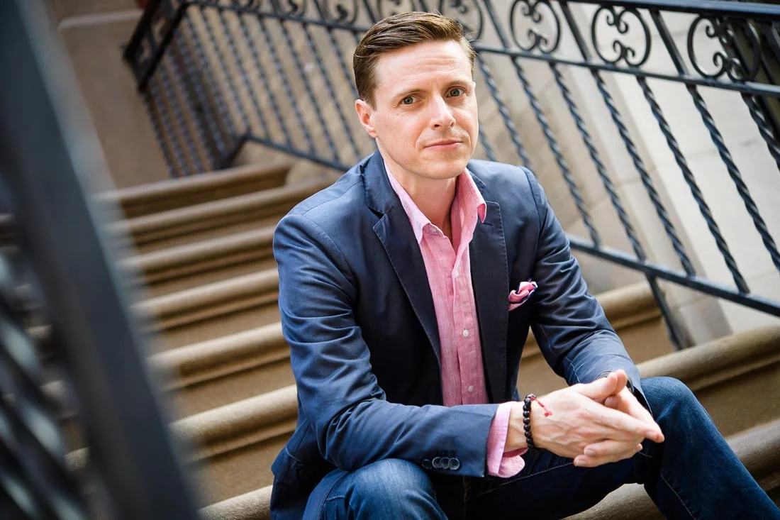 Branded Lifestyle Portrait Speaker Coach James Taylor headshot while on stoop