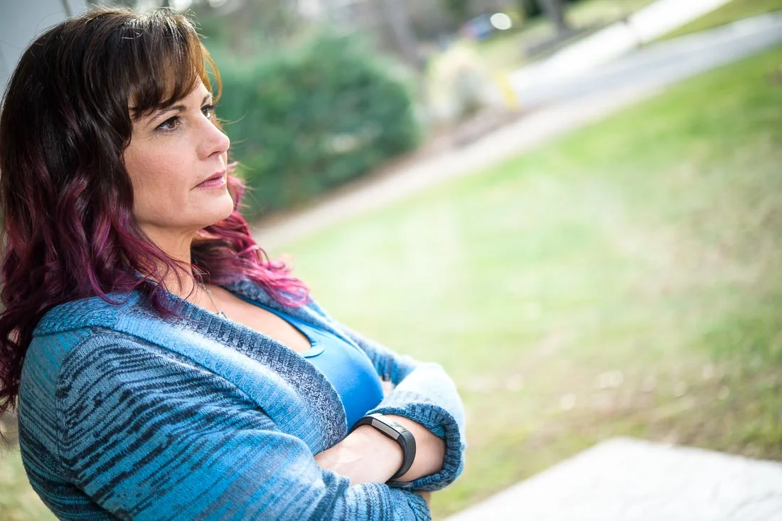 NYC Branded Lifestyle Portrait Tricia Kallmeyer thinking with arms folded