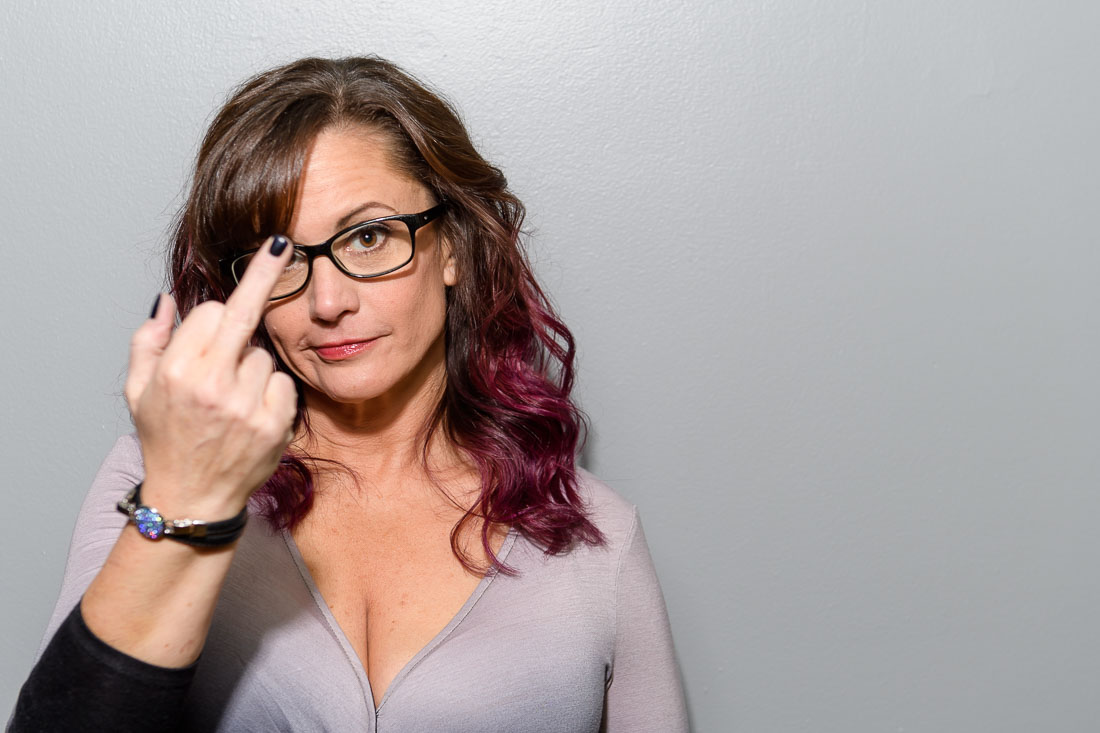 NYC Branded Lifestyle Portrait Tricia Kallmeyer giving middle finger