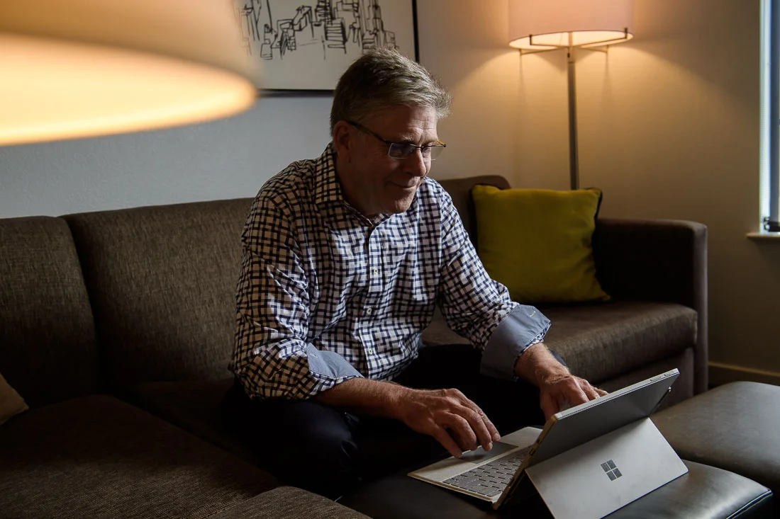 NYC Branded Lifestyle Portrait Randy Owens typing on computer