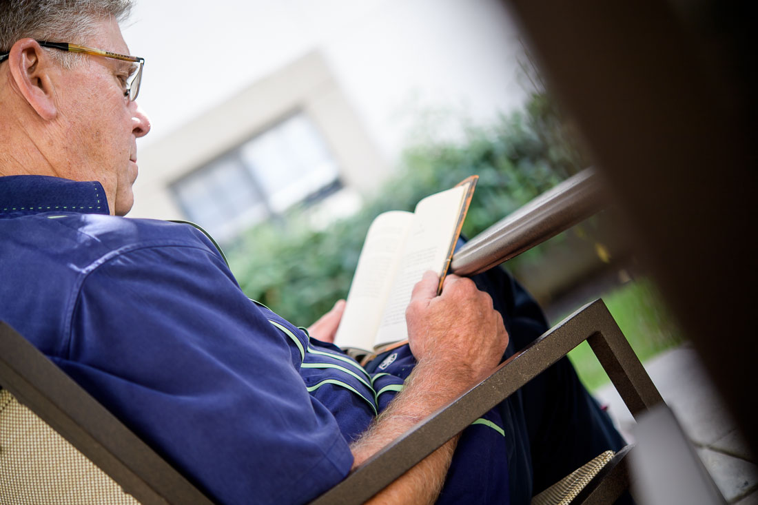 NYC Branded Lifestyle Portrait Randy Owens reading a book