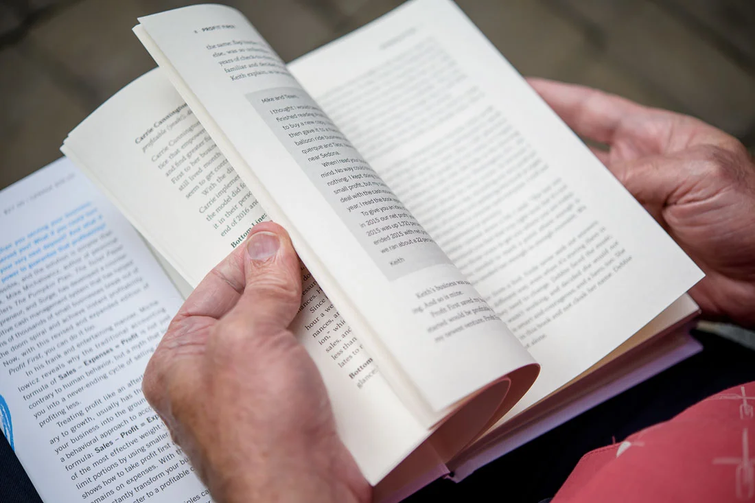 NYC Branded Lifestyle Portrait Randy Owens closeup flipping book pages