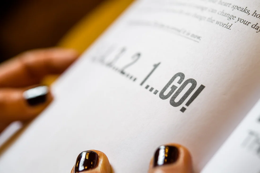 branded lifestyle portrait fitness &amp; health coach Kristi Data reading book