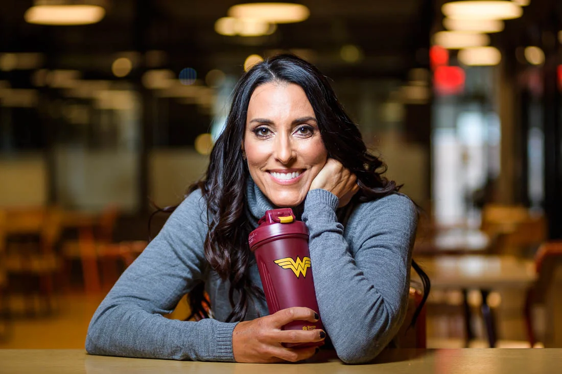 branded lifestyle portrait fitness &amp; health coach Kristi Data portrait with wonder woman shaker