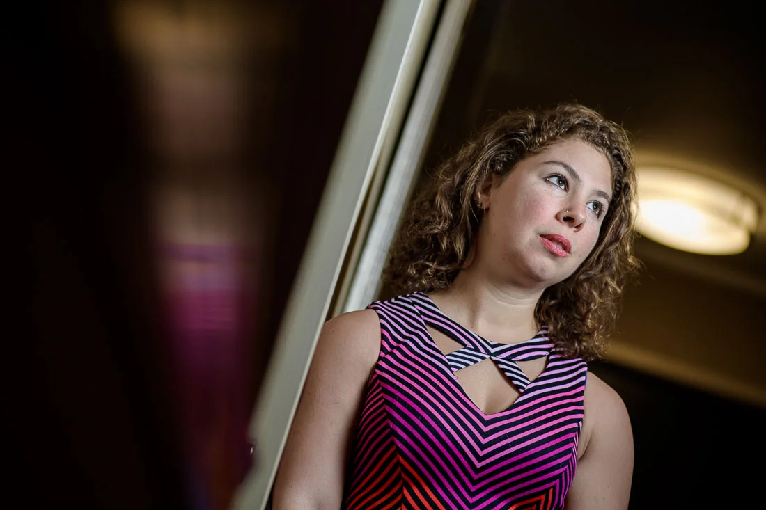 Branded Lifestyle Portrait Naturopath Serena Goldstein thinking to herself