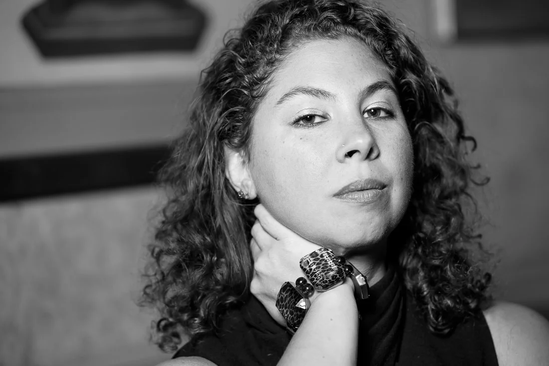 Branded Lifestyle Portrait Naturopath Serena Goldstein looking into camera pensively