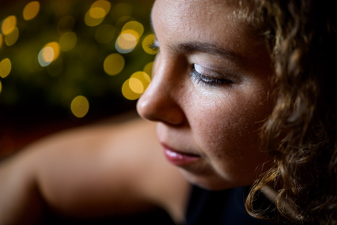 Branded Lifestyle Portrait Naturopath Serena Goldstein looking down thinking