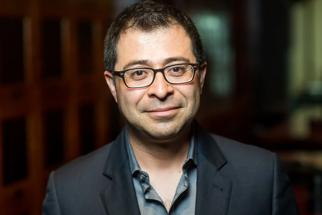 NYC Branded Lifestyle Portraits Cigar Merchant Luis Paredes headshot - slight smirk