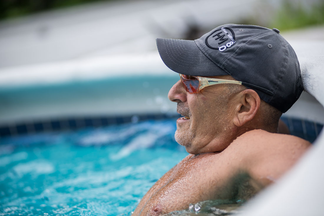 NYC Branded Lifestyle Portraits speaker author Ted Rubin  relaxing by side of pool