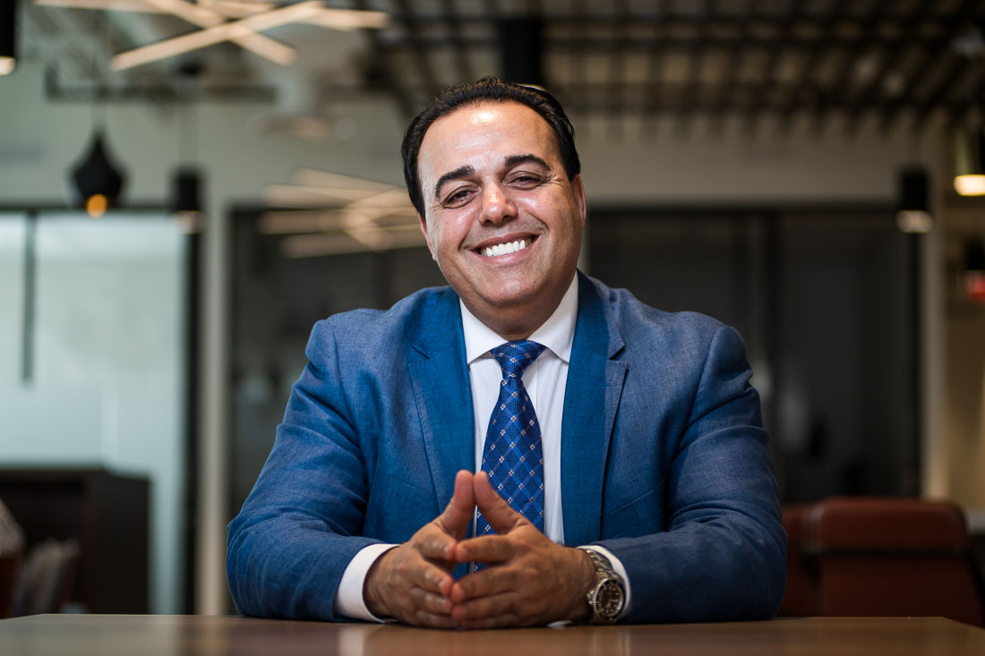 NYC Branded Lifestyle Portraits Sales Executive Speaker Anthony Chaine smiling for camera