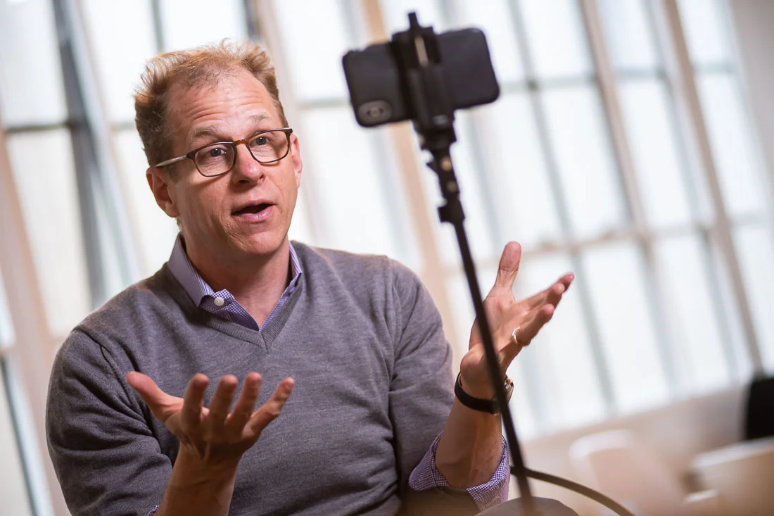NYC Branded Lifestyle Portraits speaker author coach Michael O'Brien shooting a livestream video