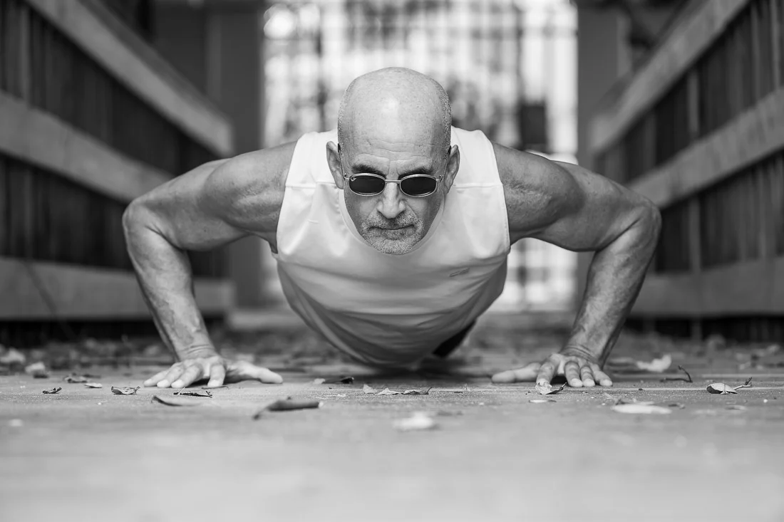 NYC Branded Lifestyle Portraits speaker author Ted Rubin doing pushups