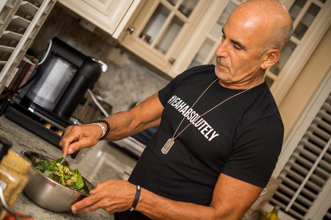 NYC Branded Lifestyle Portraits speaker author Ted Rubin making a salad
