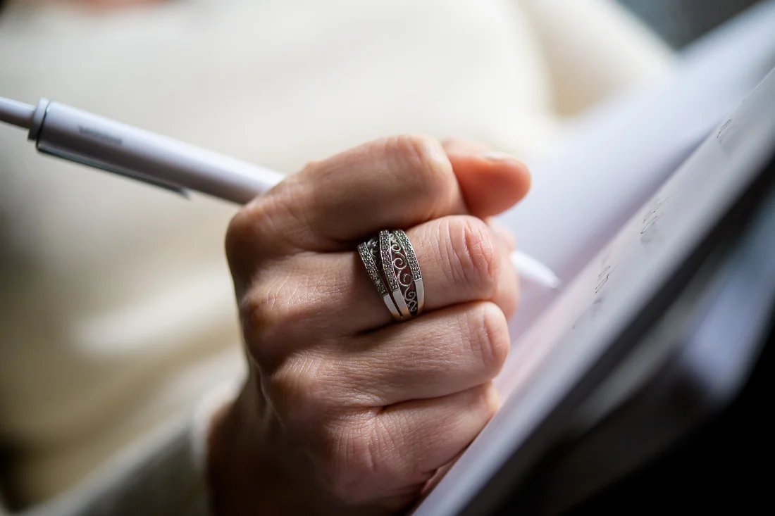 NYC Branded Lifestyle Portraits Lifestyle Strategist Dr Samantha Hiotakis hand closeup writing in notebook