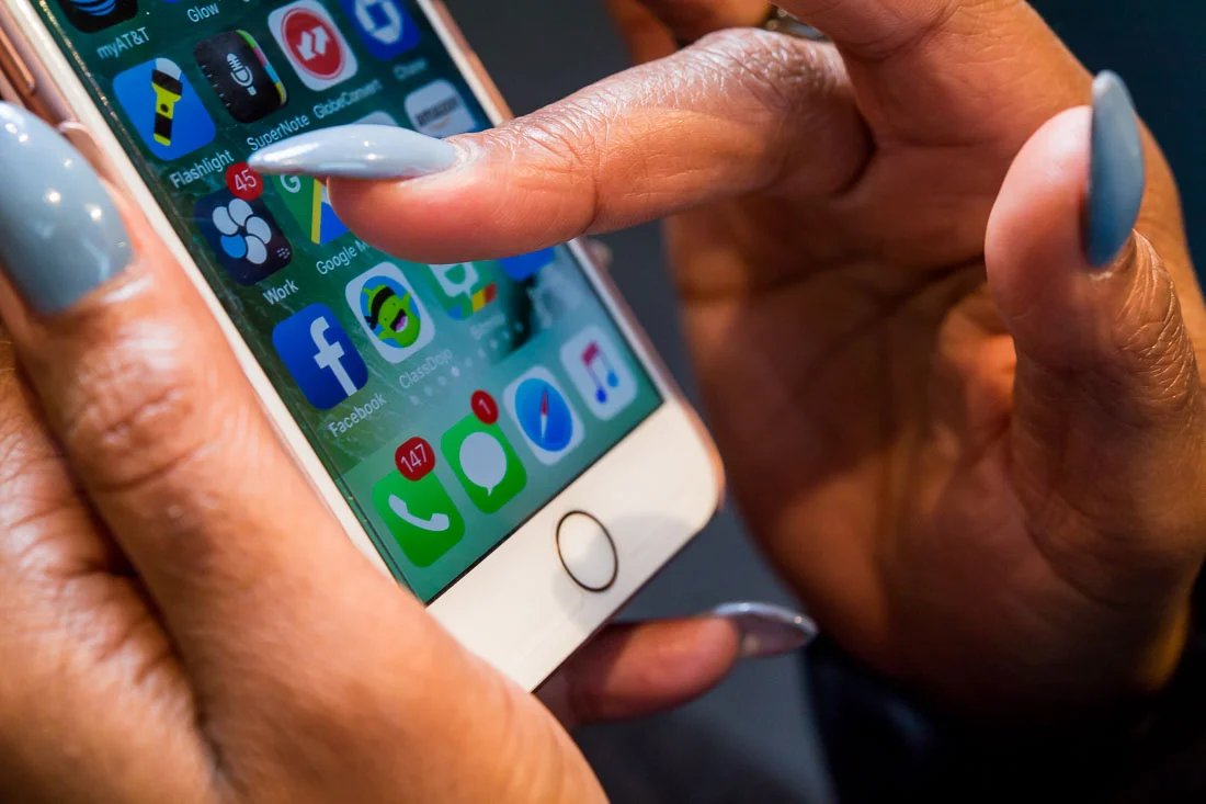 NYC Branded Lifestyle Portraits Lawyer Speaker Chinwe Esimai closeup hand on phone